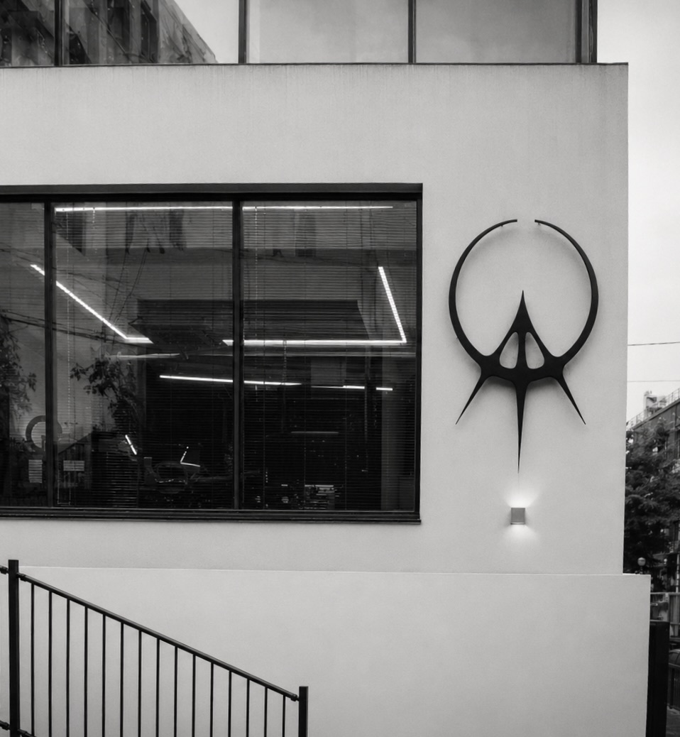 OAA Studio exterior — the studio emblem on the facade